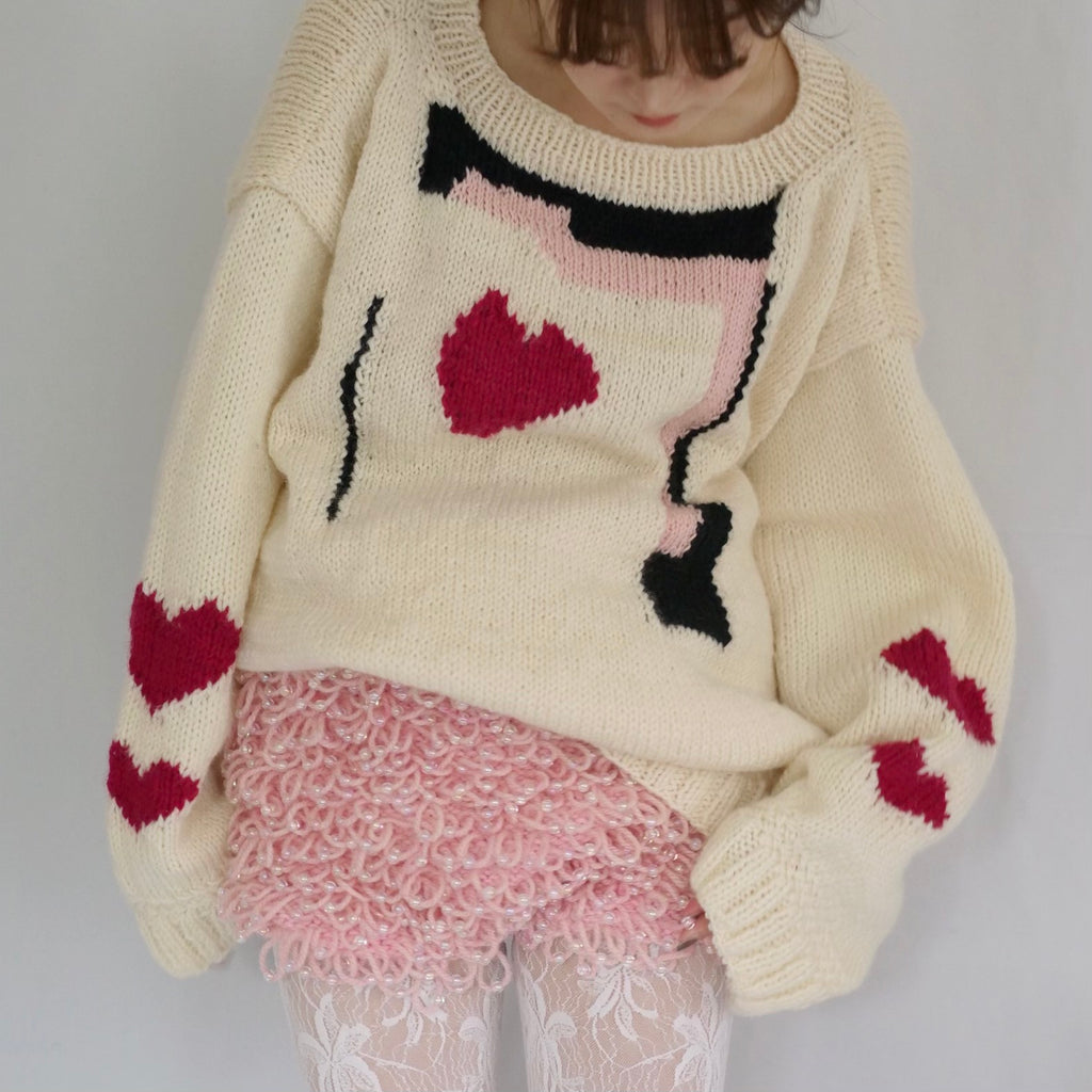 Hand-knitted sweater with coeur-rouge